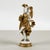 This refined capodimonte ceramic sculpture depicts a dancer in a dynamic and elegant pose, typical of mid-twentieth-...