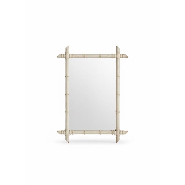 Beautiful French faux bamboo wall mirror featuring a crisply carved frame designed to resemble bamboo poles. Finished in a...