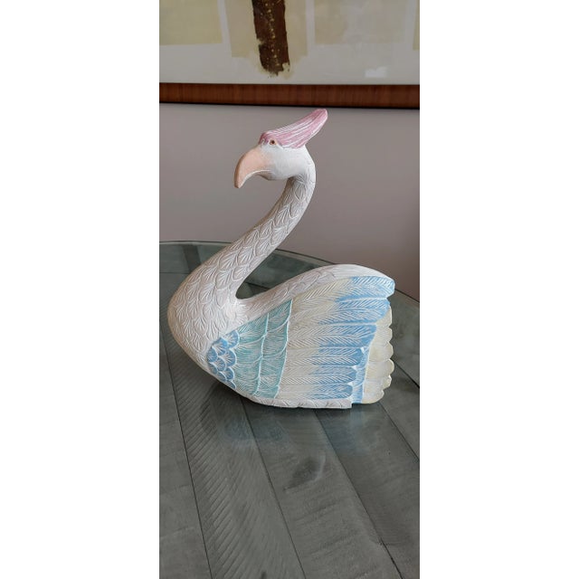 Very beachy cast ceramic long necked bird. Is it a swan, an egret, a heron? It's a gorgeous and heavy, largish decoration...