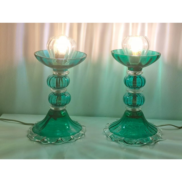 A pair of murano glass table lamps, a true gem of italian design, vintage from the 1970s. Crafted by murano master...