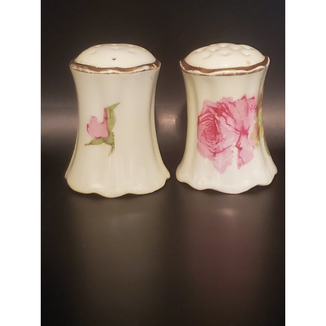 Royal Austria China Oscar & Edward Gutherz Rose Salt and Pepper Shakers. Features rose and leaf pattern with gold trim....
