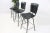 Here for you are these beautiful and classic Mid Century Modern slatted bar stools. The previous owner painted them black,...
