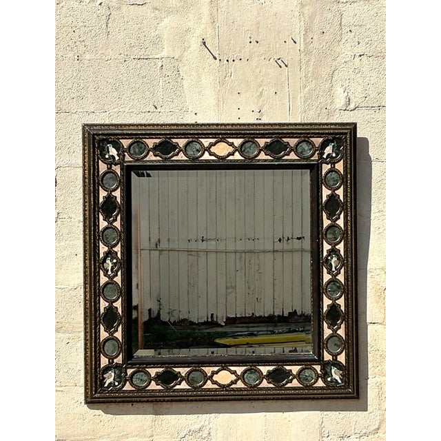 Add an air of timeless elegance to your space with this exquisite vintage Maitland Smith specimen stone mirror. Framed...