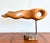 This abstract wood sculpture by James Coutant, dated 2002, is a striking example of organic minimalism. Carved from a...