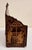 A finely worked black lacquered papier mâché letter holder from Japan's Meiji period, its shaped, arched back and...