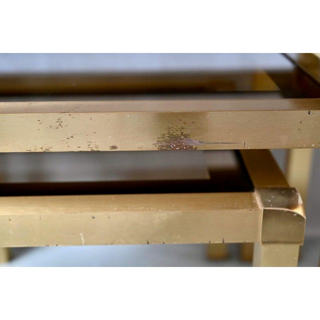 Hollywood Regency Style Nesting Tables or Flying Tables in Gold Metal and Smoked Glass, 1970s, Set of 3 For Sale - Image 16 of 18