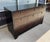 The Crate & Barrel Ferris 7-Drawer Dresser features a clean, modern silhouette with a rich dark wood finish, streamlined...