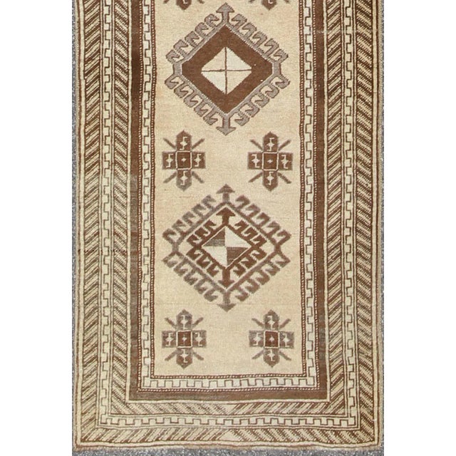 Light camel, brown, and taupe Oushak runner from Turkey with tribal geometric design, Keivan Woven Arts rug #TRA-180401,...