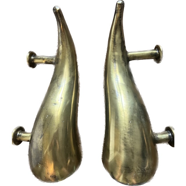 This is a beautiful pair of heavy solid brass "horn" door pulls with a patina finish. They were custom made by First...