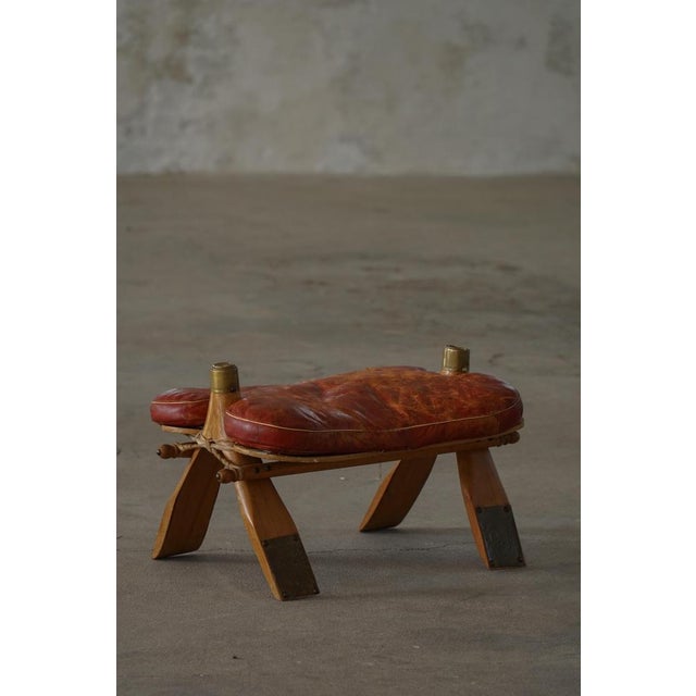 20th Century Dark Red Moroccan Camel Saddle Footstool, North Africa, 1940s For Sale - Image 4 of 18