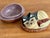 Handmade papier-mâché box, handpainted and shaped to the form of two cats in a basket. Light age wear to lacquer. Rare and...