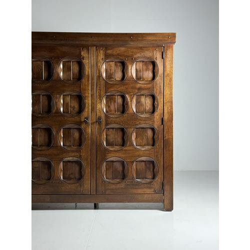 Brutalist-style cabinet. Vintage wardrobe/cabinet/wall unit. Presumably from the Netherlands, 1970s. Made of solid oak....