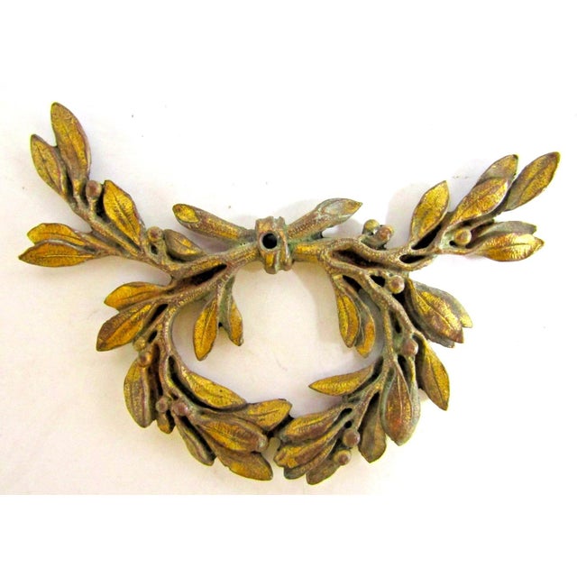 Set of Eight Antique French Gilded Bronze Ormolu Furniture Pediments From left to right: 1 - Measures 2 5/8" wide and 1...