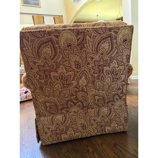 Meticulously kept, factory-original 2008 Ethan Allen custom swivel chair. Hand-tailored in North America featuring their...