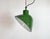 Industrial green enamel factory pendant light made in United Kingdom during the 1960s. White enamel inside the shade....