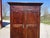 Beautiful, medium-sized Louis Philippe period wardrobe in solid walnut. Two large, paneled walnut doors with original...