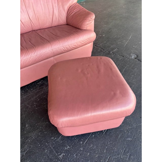 Pink leather postmod loveseat w/ ottoman ready to liven up your living area! Well-made by a once renowned manufacturer in...