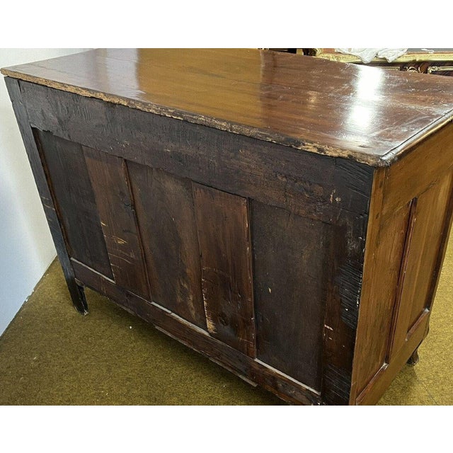 Curved Lyonnaise chest of drawers Louis XV period in solid walnut circa 1750 Front opening with 3 elaborately carved...