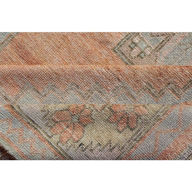 Vintage Turkish Oushak Gallery With Tribal Medallions in Soft Peach and Green For Sale - Image 12 of 13