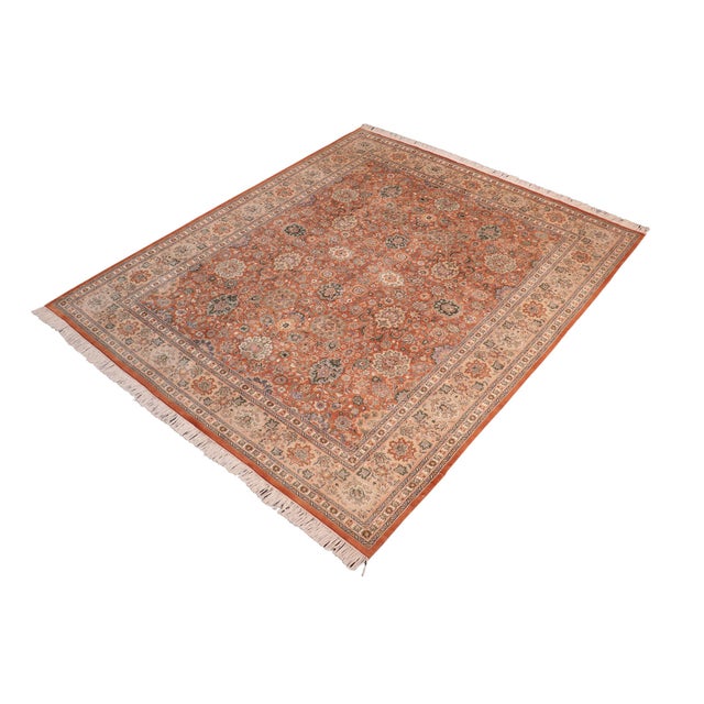 Designed with mesmerizing intricacy and gorgeous color palette, this hand-knotted masterpiece demonstrates the beauty and...