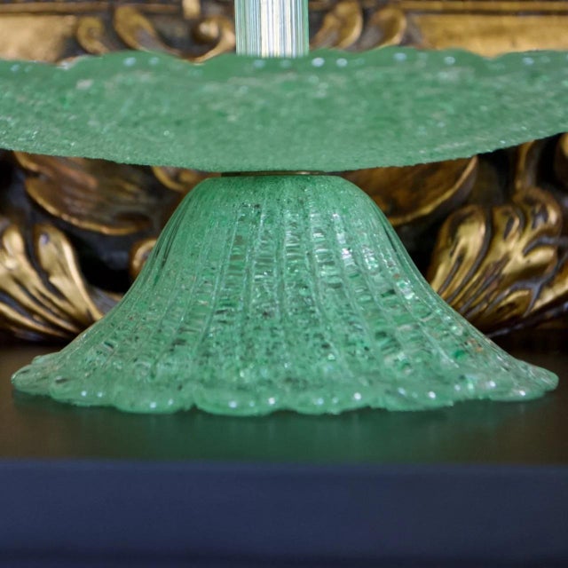 Elegant Bohemian glass epergne featuring a three-tiered tidbit tray design in rich green overshot glass. The textured...
