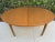 1960s Mid Century Modern Teak Oval Butterfly Leaf Dining Table. For Sale - Image 10 of 13