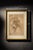 A beautifully framed reproduction of Leonardo da Vinci’s Head of a Woman (La Scapigliata), presented with a softly aged,...