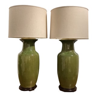 Late 20th Century Hollywood Regency Monumental Olive Green Ceramic Lamps With Satin Brass Hardware and Linen Drum Shades - a Pair For Sale