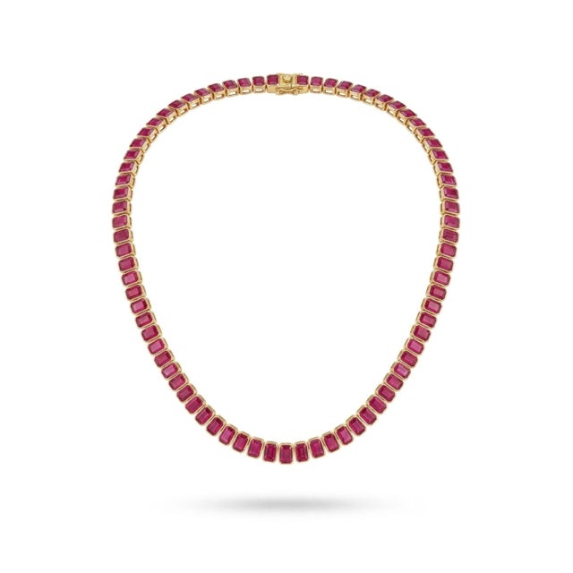 GEMSTONE DETAILS Gold Purity: 18K Solid Gold RUBY WEIGHT: 44.88 CTS 18K GOLD NET WEIGHT: 25.97 GRAMS GROSS WEIGHT: 34.95...