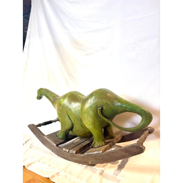 This is a whimsical piece of folk art history still rocking today! Hand carved heavy wooden build with original weathered...