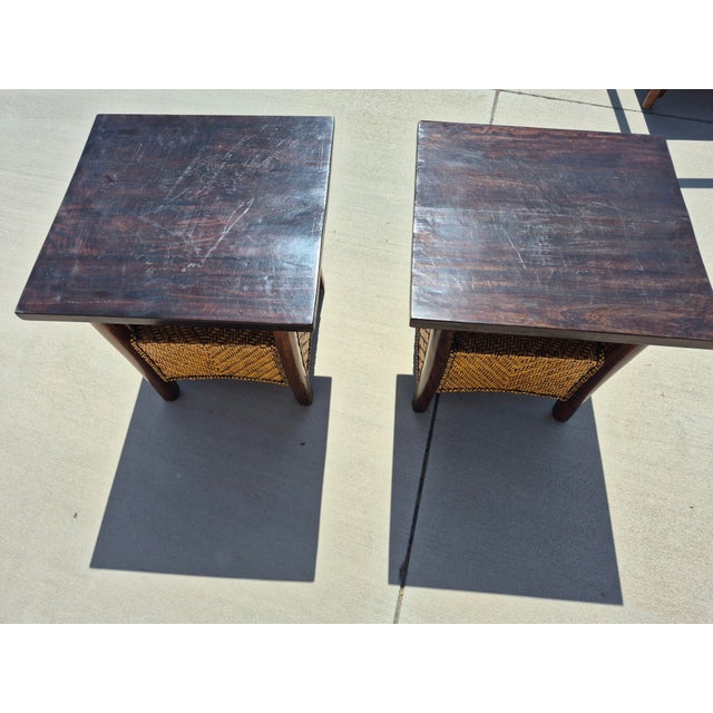 This pair of mid-century Mexican modernist-style side tables features a striking mix of organic textures and bold...