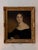 A beautifully painted early 19th century half-length portrait of a young woman in a low-cut black dress, her dark curls...
