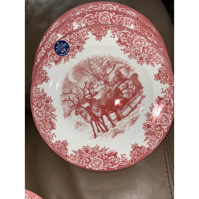 Bring joyful holiday magic to your table with this charming Royal Stafford Christmas Dinner Plate featuring Santa in his...