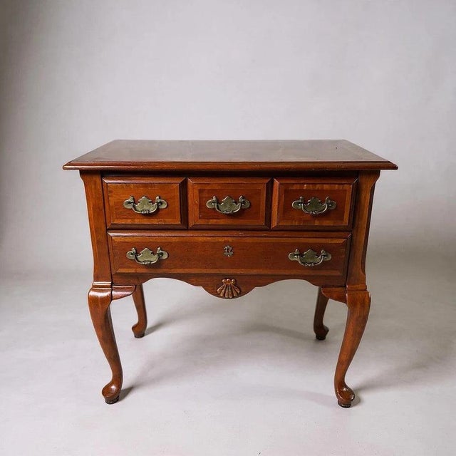 The Queen Anne Cabinet is a vintage side cabinet designed to enhance your home with elegant storage and period charm. This...