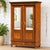 Elevate your home with this magnificent antique double-door armoire wardrobe. Crafted with a rich, warm-toned exterior...