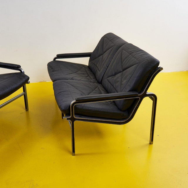 Pair of aluminum and leather sofas by andre vanden beuck height: 75 width: 130 depth: 80 seat height: 43 additional...