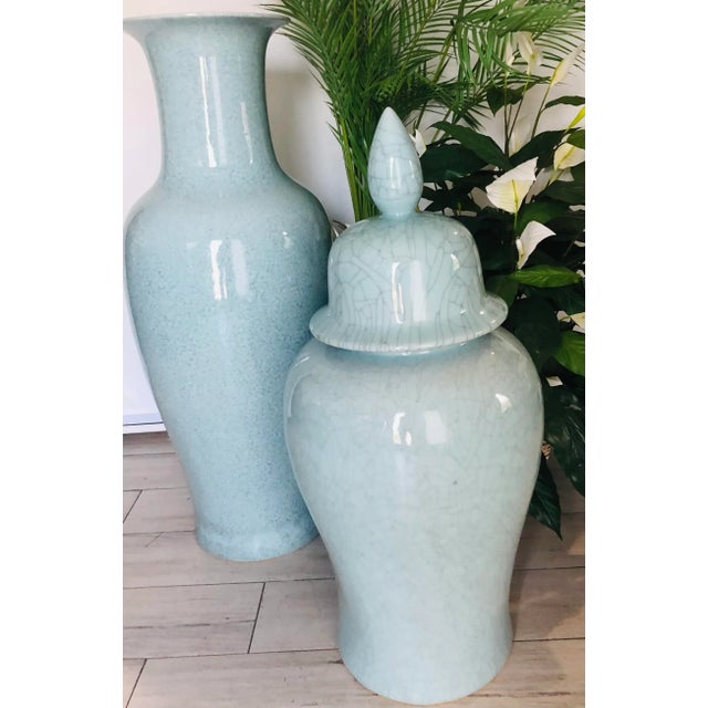 This is a fantastic set of large Chinese vintage altar vases from the Midcentury, a beautiful crackle finish and flaring...