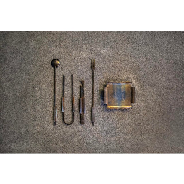Cocktail tools in silver-plated brass. Designer attributed to Gio Ponti Manufacturer PM Italy 1960s This piece has an...