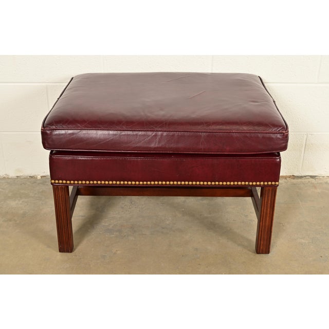 A gorgeous Chippendale or English Traditional style ottoman or footstool By Hancock & Moore USA, Circa 1980s Mahogany...