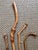 Hand-carved set of four twisted and knobby walking sticks. Each one is unique. Please see condition details noted....
