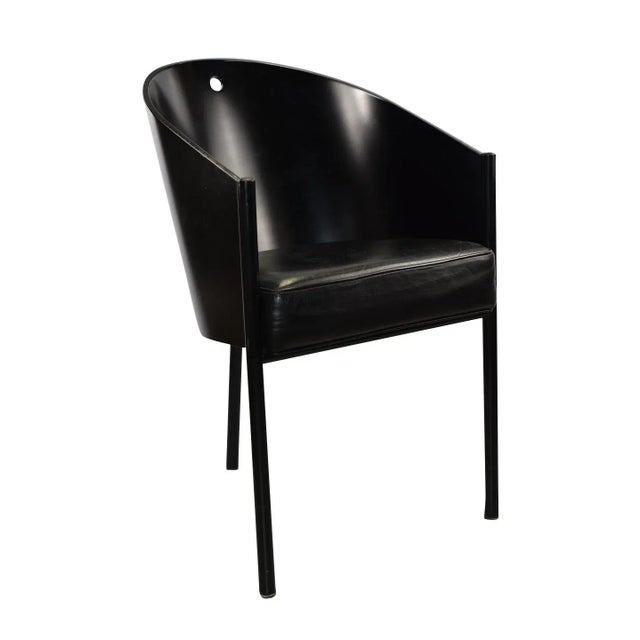 Set of four 3-legged modern black cafe chairs designed by Philippe Starck in the 1980's. Illegible signature to metal...