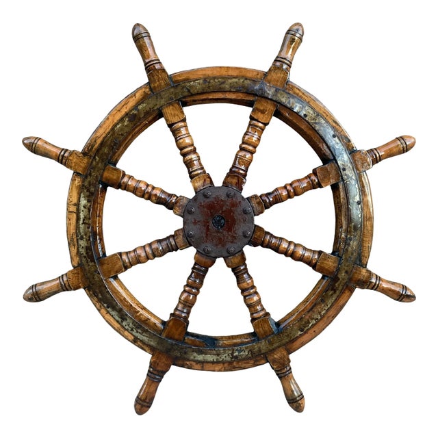 Early 20th century 8 arm ship’s helm (steering wheel) in cast iron, carved mahogany, and oak, piece being sold as found,...