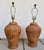 In the style of Ralph Lauren Home, this fabulous pair of woven rattan wicker ginger jar shaped table lamps with round...