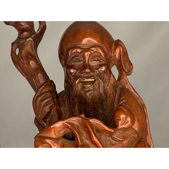 Antique Chinese God of Longevity Carved Rosewood Figurine for your consideration. The carving is a nice mid-size,...