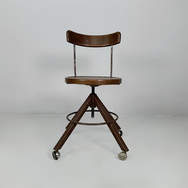 Italian mid-century modern wooden and metal chair with casters, 1940s Chair with a round wooden seat, adjustable in...