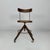 Italian mid-century modern wooden and metal chair with casters, 1940s Chair with a round wooden seat, adjustable in...
