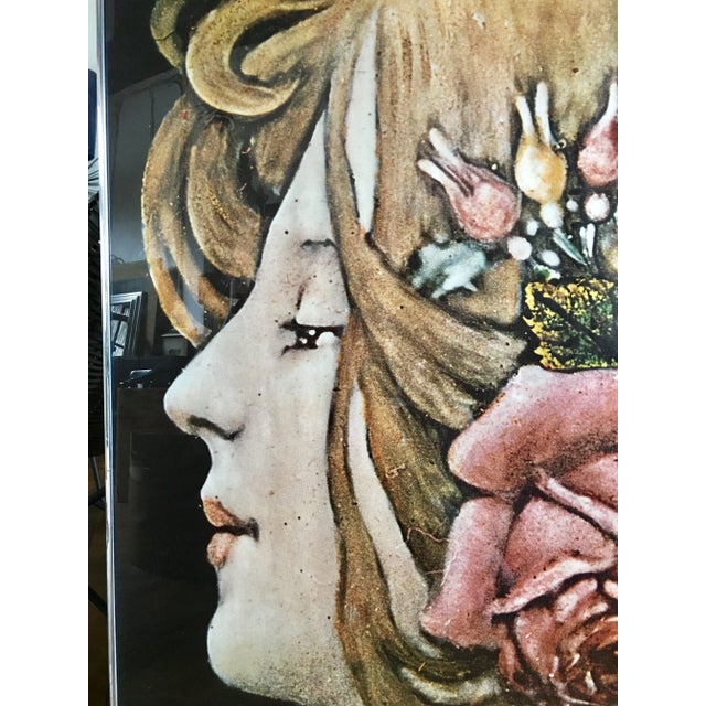 Large Mid Century Modern "Milano 70/70" unsigned offset lithograph featuring a portrait of a floral adorned female. Framed...
