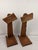 An unusual matching pair of vintage Mid-Century primitive wooden wall shelf sconces featuring distinctive sculptural...