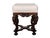 Upholstered stool with bun feet. Grotesque leg carvings. Apron with floral motifs.