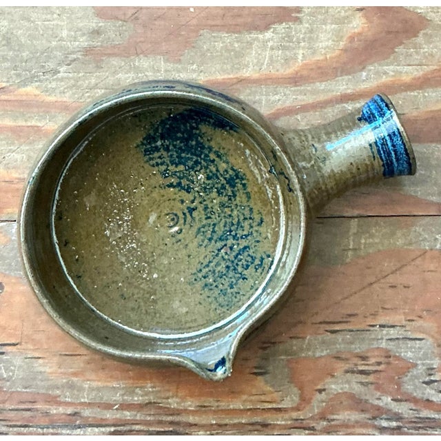 This authentic piece of vintage studio pottery exemplifies the organic, handcrafted aesthetic popular in the mid-to-late...